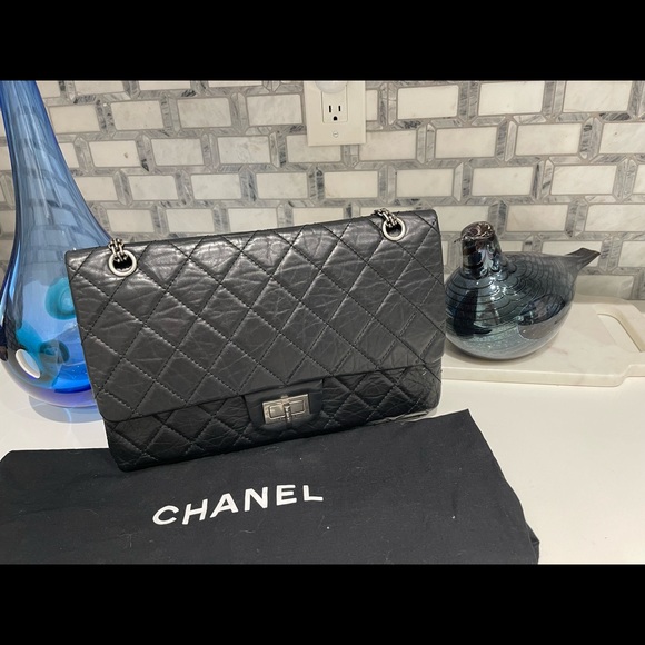 CHANEL Handbags - Chanel Black Purse 2.55 lamb skin comes with dust bag and box.. Quilted
